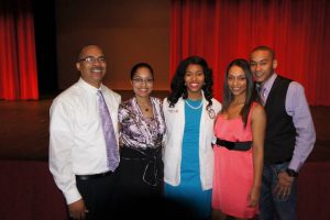 Jameshia Below with her family after being accepted into ULM's Pharmacy school. 
