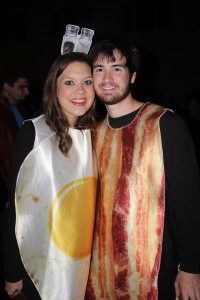 Because you can't have eggs without the bacon. Students sporting a breakfast combo for Halloween Ball.